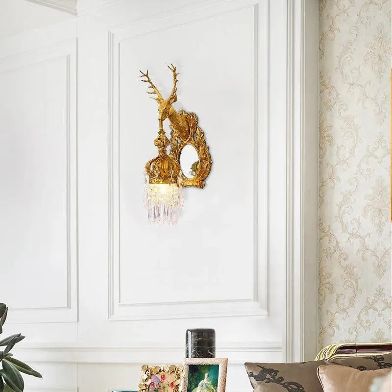 Regal Brass and Crystal Deer Head Wall Lamp for Sophisticated Living Room Ambiance.